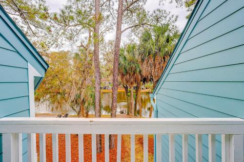 a view from the porch of a blue house at Egrets Pointe, Unit 492 in Edisto Island