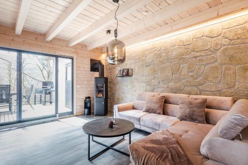 Гостиная зона в Bergwaldchalets Wellness