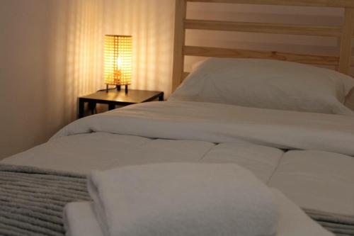 Postel nebo postele na pokoji v ubytování Katsikantaris Homes
