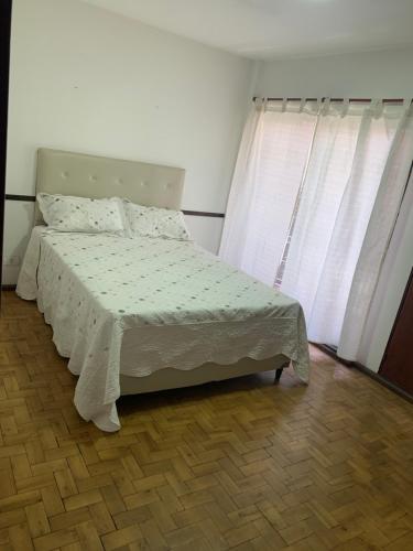 A bed or beds in a room at Armonía 1
