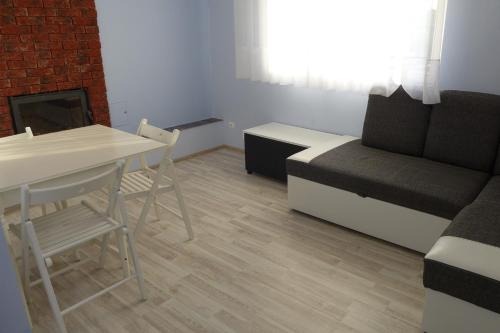 Χώρος καθιστικού στο Apartamenty Żabcia