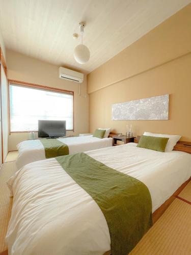 Accommodates up to 11 guests!!Staypia Condominium Namba Ebisu