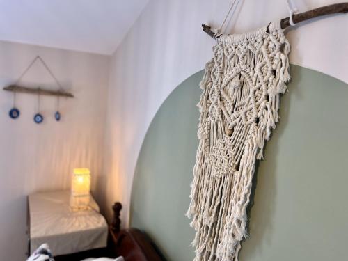 a room with a curtain hanging on a wall at Villa Merci Budva in Budva