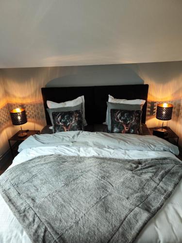 Una cama o camas en una habitación de Lanonweye