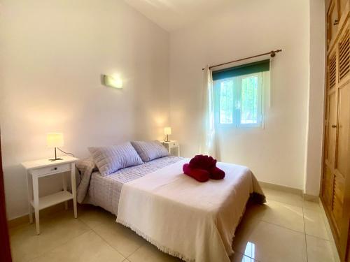 En eller flere senge i et værelse på Apartamento 11. Arena y mar