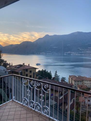 a view of a large body of water from a balcony at ORO, 8 in Bellano