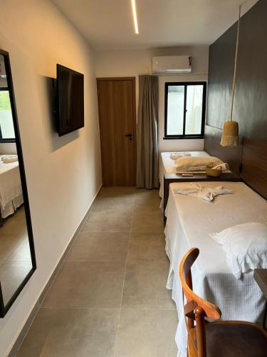 Ένα ή περισσότερα κρεβάτια σε δωμάτιο στο Maly Boutique Hotel