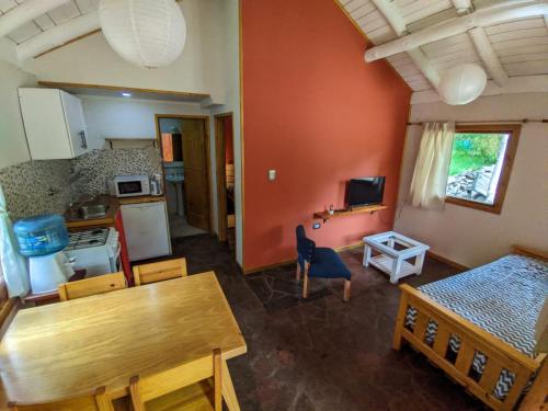 an aerial view of a kitchen and a living room at Cabañas Shalom in Lago Puelo