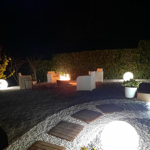 a night view of a patio with lights at Villa Lara in Marsaglia