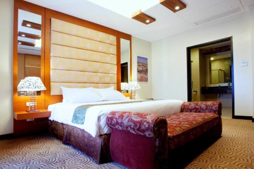 Säng eller sängar i ett rum på Hotel Elizabeth Cebu