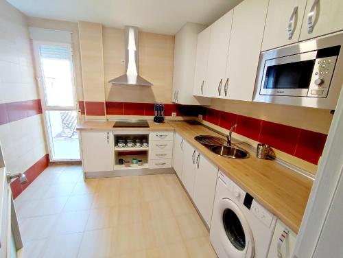 Apartamentos Sol Rastroにあるキッチンまたは簡易キッチン
