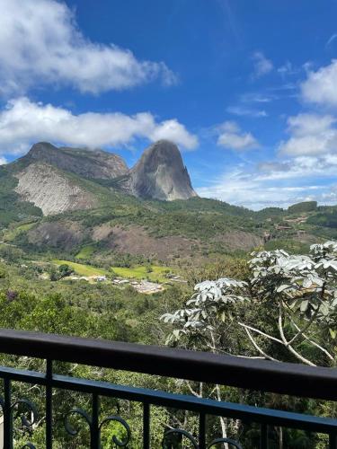 a view of a mountain from a balcony at Condomínio VISTA AZUL in Domingos Martins
