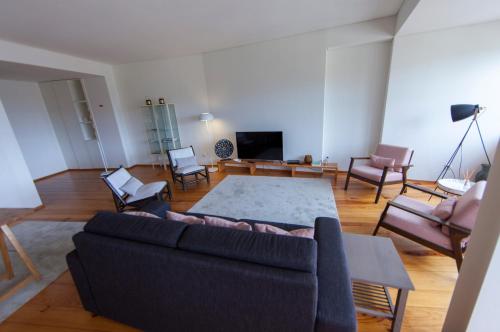 Télévision ou salle de divertissement dans l'établissement Citybreak-apartments Douro View