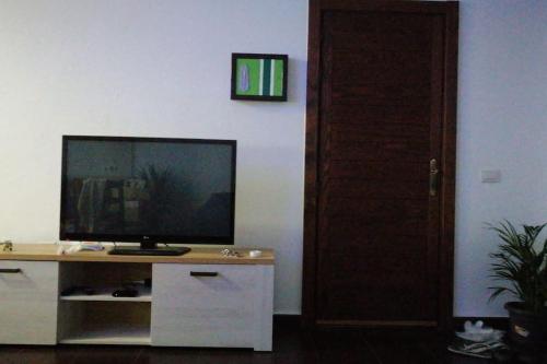 TV a/nebo společenská místnost v ubytování Portonovo Great Ocean