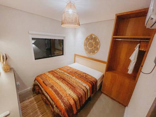 Cama ou camas em um quarto em Casas3Milagres-Gratidão