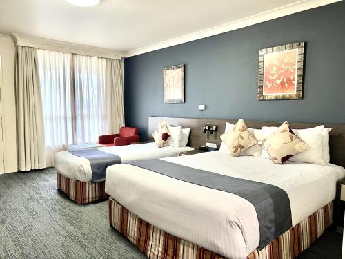 Кровать или кровати в номере Bathurst Motor Inn