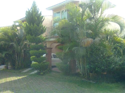 Zahrada ubytování CASA EN CONDOMINIO CON ALBERCA EN CUAUTLA MORELOS