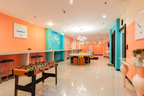 Гостиная зона в Sans Hotel Finest Medan