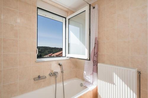 A bathroom at Charilena's luxury apartment