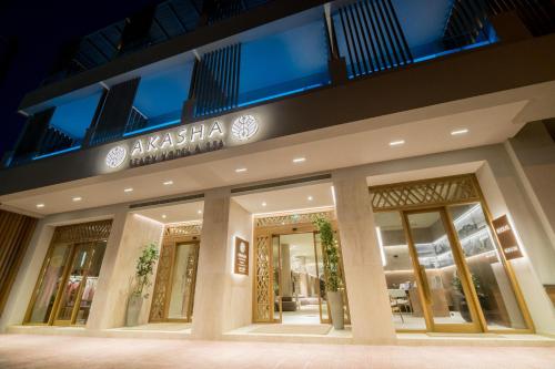 a store front of a mall at night at AKASHA Beach Hotel & Spa in Hersonissos