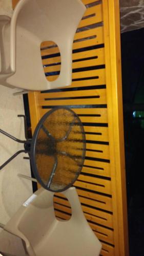 a magnifying glass sitting on top of a table at Eros apartmani in Zlatibor
