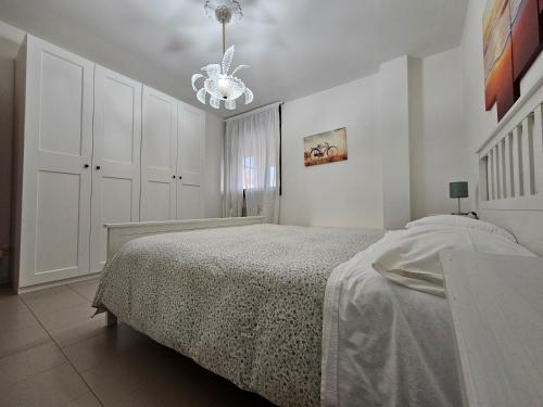 Posteľ alebo postele v izbe v ubytovaní Interno 14