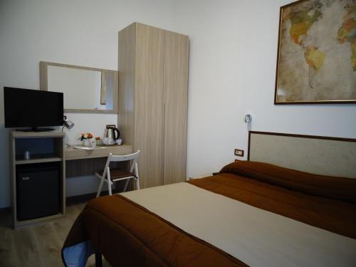 Katil atau katil-katil dalam bilik di Hotel La Torre