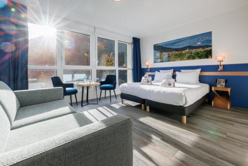 Posezení v ubytování Hotel SPA Husseren Collections - Proche Colmar - Eguisheim