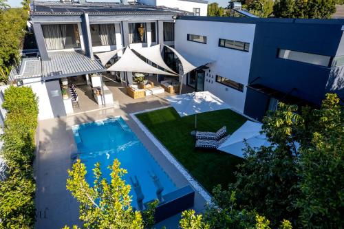 an aerial view of a house with a swimming pool at The Jewel B&B in Cape Town