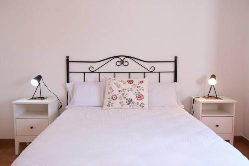 Postel nebo postele na pokoji v ubytování Casa Tita