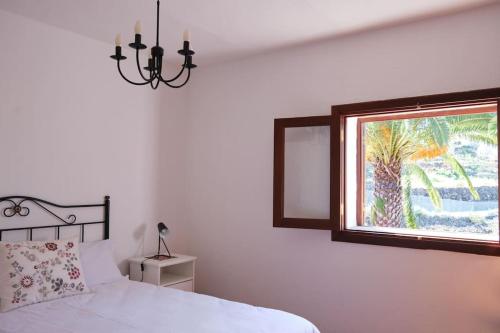 Postel nebo postele na pokoji v ubytování Casa Tita