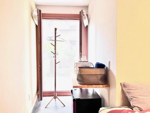 a room with a mirror and a sink at 池袋Apila in Tokyo