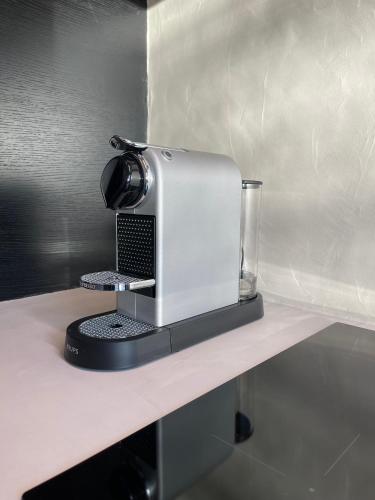 a toaster sitting on top of a counter at 3 Bedroom Art-Nouveau Apartment with Free Parking in Ghent