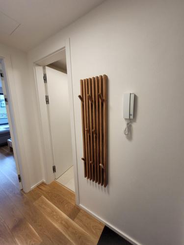 a room with a door with a radiator on the wall at Molo Lipno in Lipno nad Vltavou