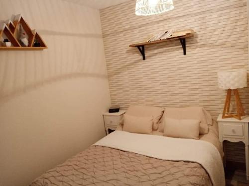 Posteľ alebo postele v izbe v ubytovaní Appartement 4 personnes vue sur la montagne