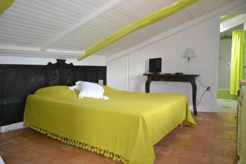 Postel nebo postele na pokoji v ubytování Maison Saint Louis avec Jacuzzi