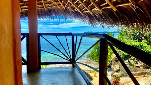 a view of the ocean from a resort balcony at VERONIKA Resort Nosy Komba in Nosy Komba