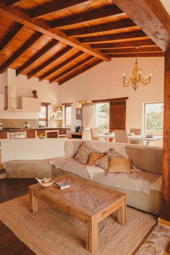 a living room with a couch and a table at Casa Maja in Lajares