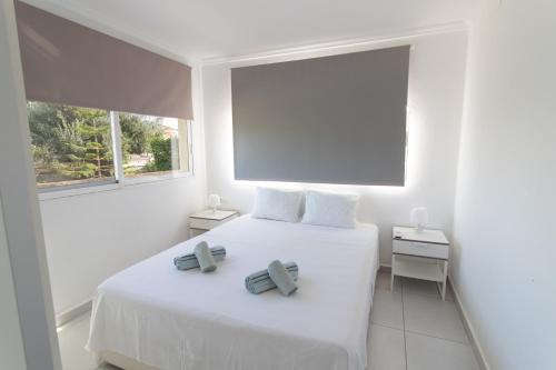 Katil atau katil-katil dalam bilik di Villa Reyets 4 bed 3 bath Private Pool