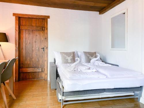 Letto o letti in una camera di Apartment WILKY in Kaprun