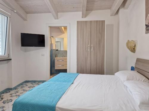 Voodi või voodid majutusasutuse Vico di Mare toas