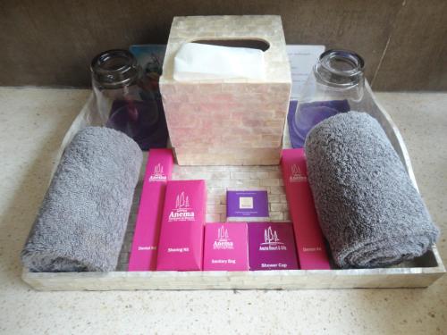 a hamper with two dogs and a box of products at Anema Wellness & Resort Gili Lombok - Diving Center PADI in Tanjung