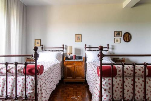 Katil atau katil-katil dalam bilik di Villa Fiori