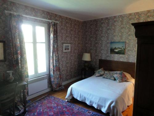 Katil atau katil-katil dalam bilik di Maison familiale typique à Sauzon avec jardin, proche du port - FR-1-418-11