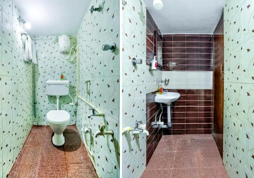 a bathroom with a toilet and a sink at Chellam Residency in Chennai