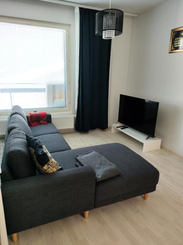 Uma área de estar em Cosy and spacious 1 bedroom apartment in Espoo
