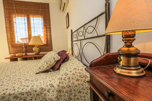 En eller flere senge i et værelse på LITORAL COSTA DORADA - EL BOSQUE Only families