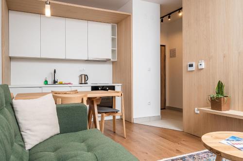 Aparthotel RAJSKAにあるキッチンまたは簡易キッチン