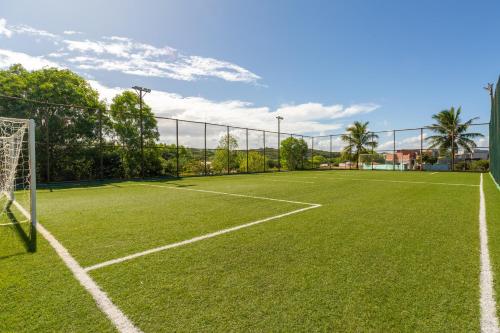 an artificial soccer field with a soccer goal at Reserva Sauípe - Casa 189 in Costa do Sauipe