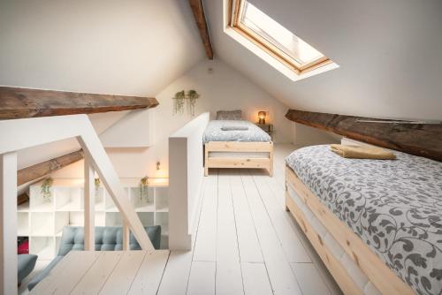 Ένα ή περισσότερα κρεβάτια σε δωμάτιο στο National Street Residence